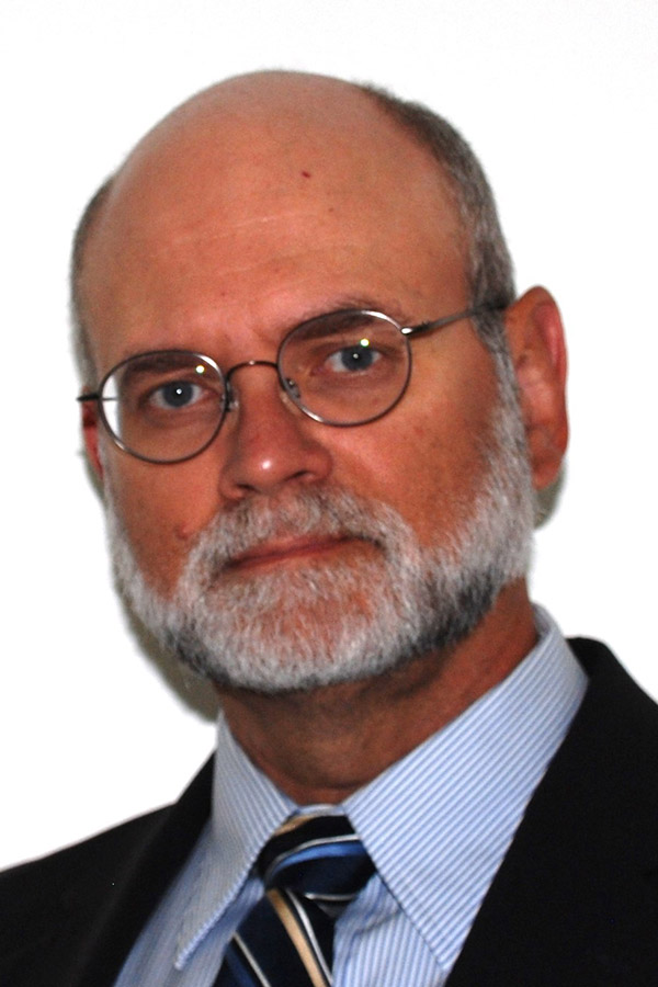 Dr. Carlos E. Del Castillo